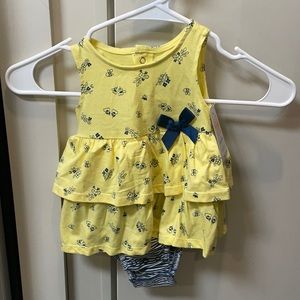 Never worn yellow dress by Carter’s